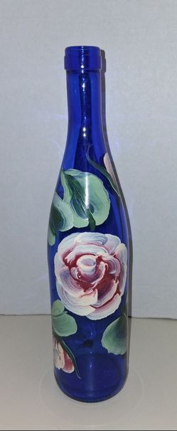 hand painted roses on blue glass wiine bottle flower vase $5 FIRM