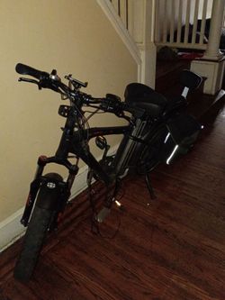 Black Electric Bike with Rear Bag