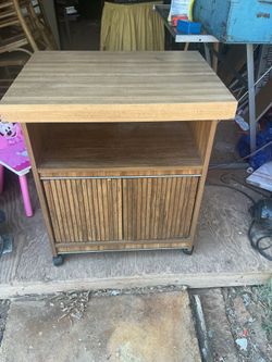 Kitchen cabinet it’s 29 inches tall and 20 by 25 inches across the top