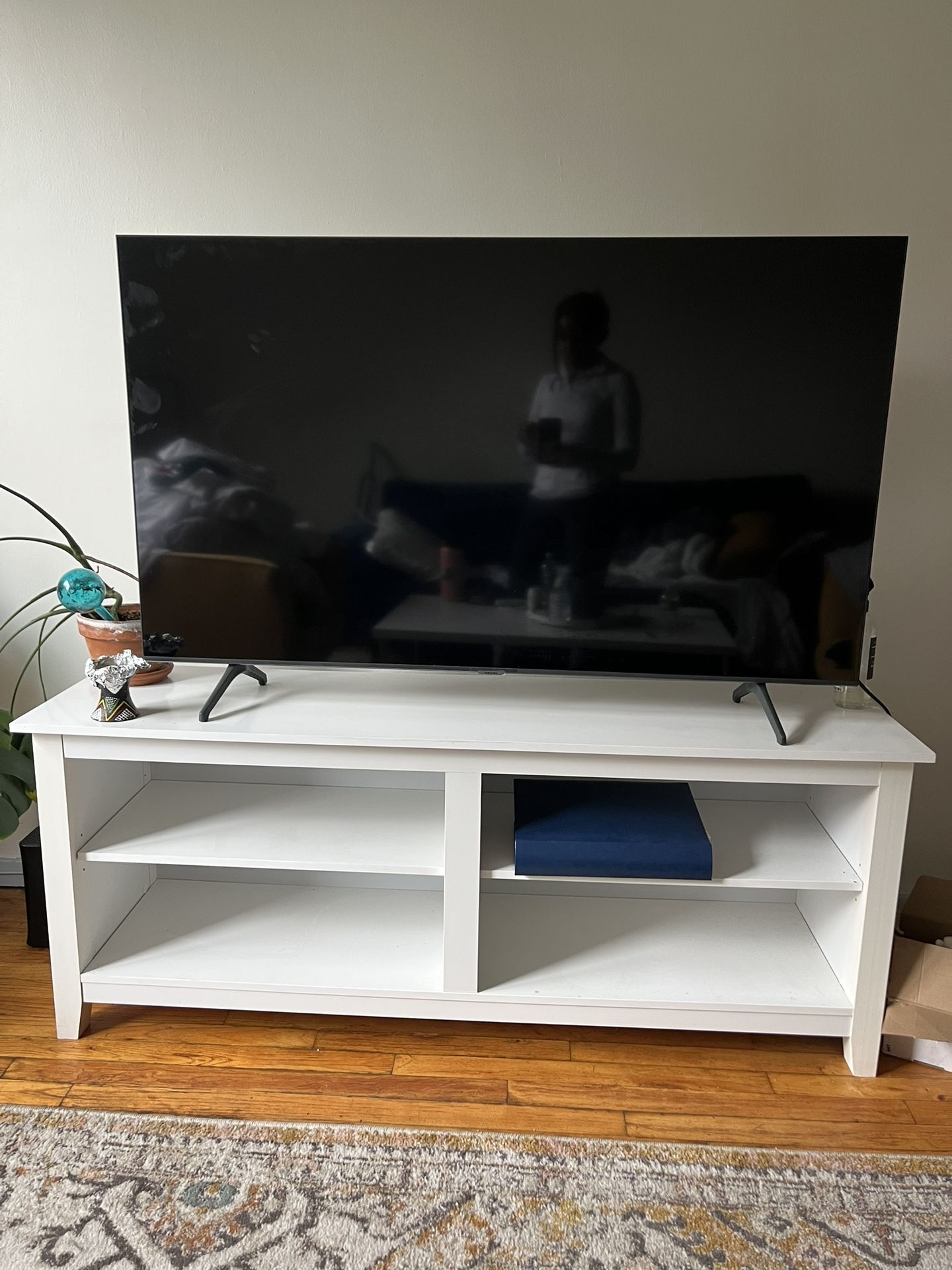 Simple, white TV stand