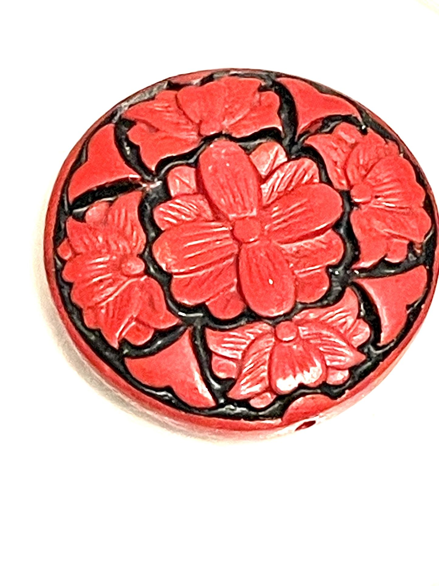 Carved Cinnabar Pendant