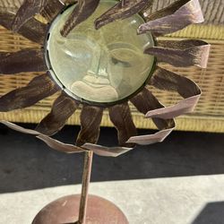 This is a vintage Zodax wind-blown sunburst glass candle holder