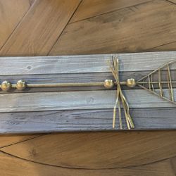 Wooden art with golden arrow 7.75”x 27.5”