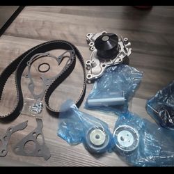 Kit con bomba de agua (correa de tiempo + bomba de agua + tensores + sellos)