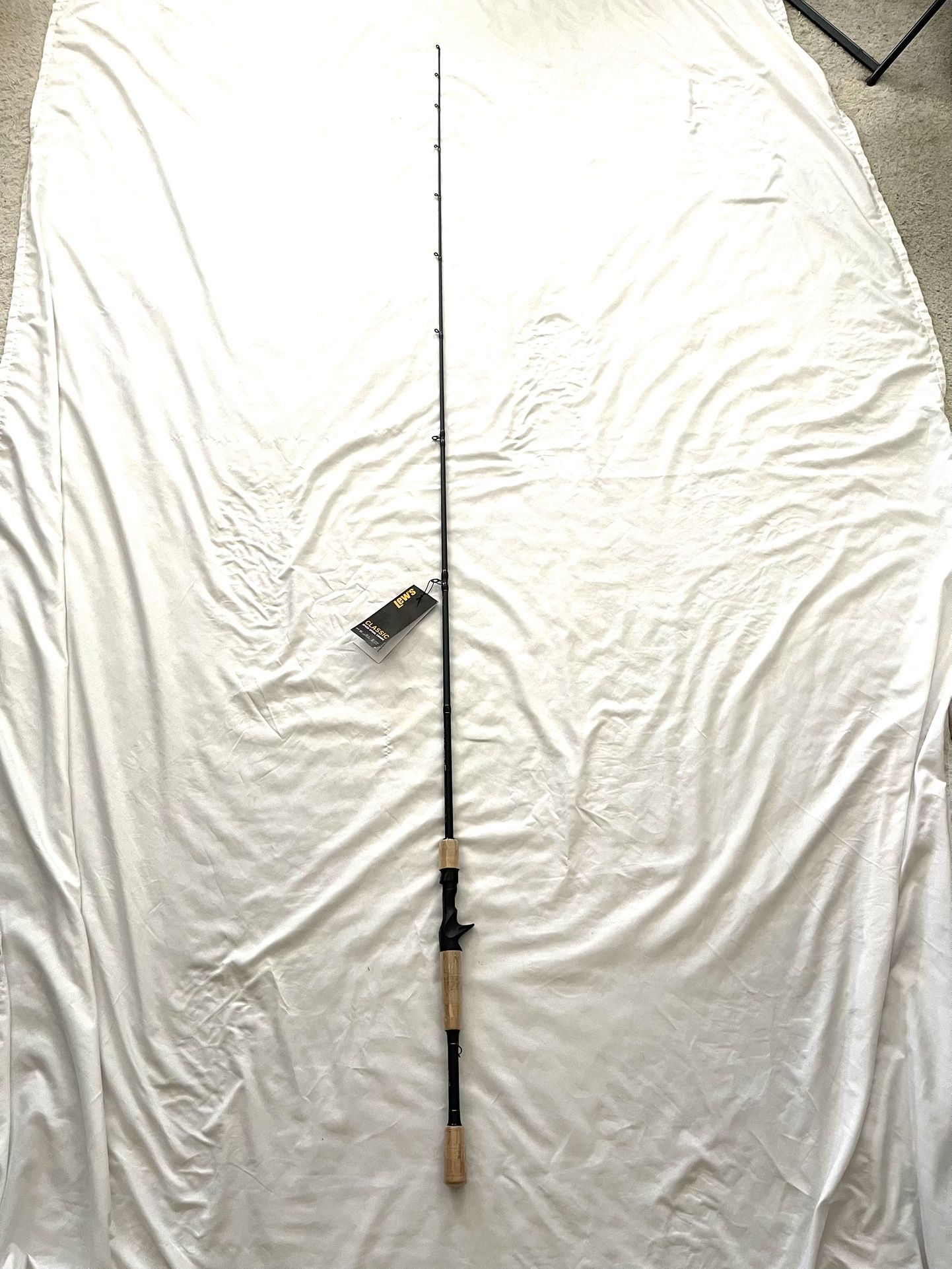 Brand New Never Used With Tags Lew’s (Classic Stick) 6.6ft Medium Action, Fishing Rod. This is for a bait caster fishing reel.