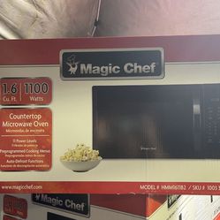 New Magic Chef 1.6 cu. ft. Countertop Microwave in Black with Gray Cavity