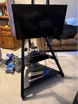 Black Swivel Entertainment Center