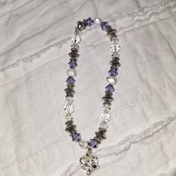 Sterling Silver And Pearl.