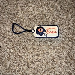 vintage chicago bears luggage tag. Lil discolored from age. Name card has been filled out
