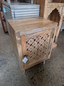 Handcrafted mango wood accent table in natural
