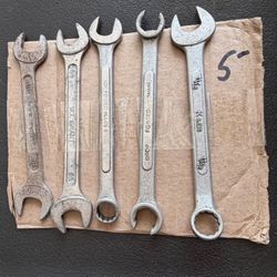 Five-piece wrench lot featuring a mix of open-end and combination wrenches from several manufacturers.