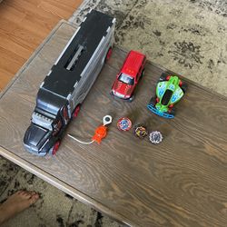 2 Cars 1 Hotweel Car Holder Truck 3 Beyblades 1 Launcher