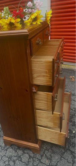 Solid wood tall chest with big drawers. Drawers sliding smoothly