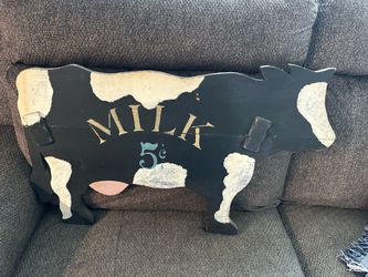 Vintage wood cow sign
