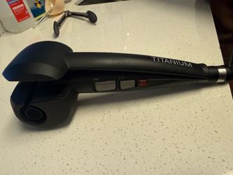 BaBylissPRO Titanium Curl Genius curling iron.
