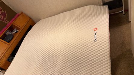 Clean king-sized Dormeo mattress topper