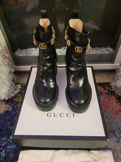 Gucci boots with store snake bottom