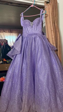 Purple glittery quinceañera dress