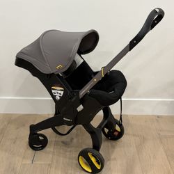 Doona Convertible Car Seat and Stroller W/ Base
