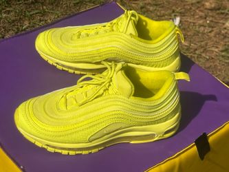 Nike Air Max 97 'Volt' sneakers, recognizable by their vibrant, monochromatic size 7