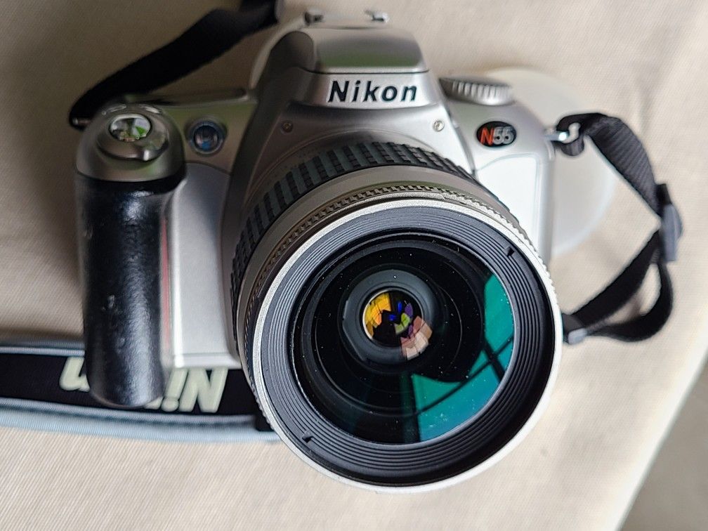 Nikon N55 film camera with Nikkor 28 80mm lens, auto and manual