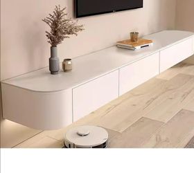 55 x 9.5 inch floating TV console with 3 drawers & LED under lighting - Color: White.