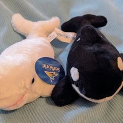 A Set Of SeaWorld Whale Stuffed Animals