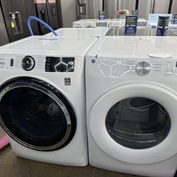 New open box GE white front load washer and gas dryer set