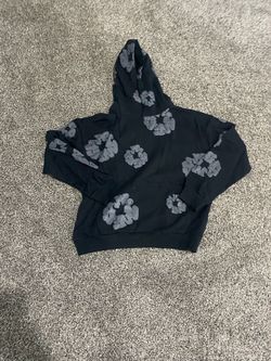 Black denim tear
