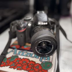 USED Nikon D3200 (Extended lens attachment [55-200mm], 8GB memory card, and camera bag included)