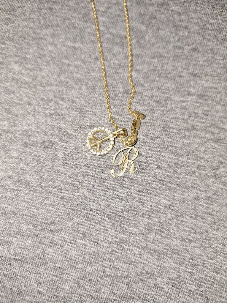 necklace,and two charms all 14k yellow gold