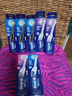 Oral B  electric toothbrushes (8)