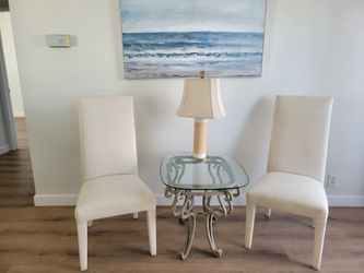 2 cream colored accent or dining chairs