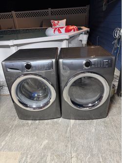 Electrolux washer and electric dryer 4.5 cubic feet working perfect clean one receipt for 6 months warranty