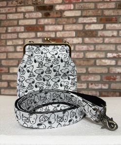 Snoopy Jacquard Kiss-Lock Pouch from https://offerup.com/redirect/?o=U25vb3B5LkNvLkpw