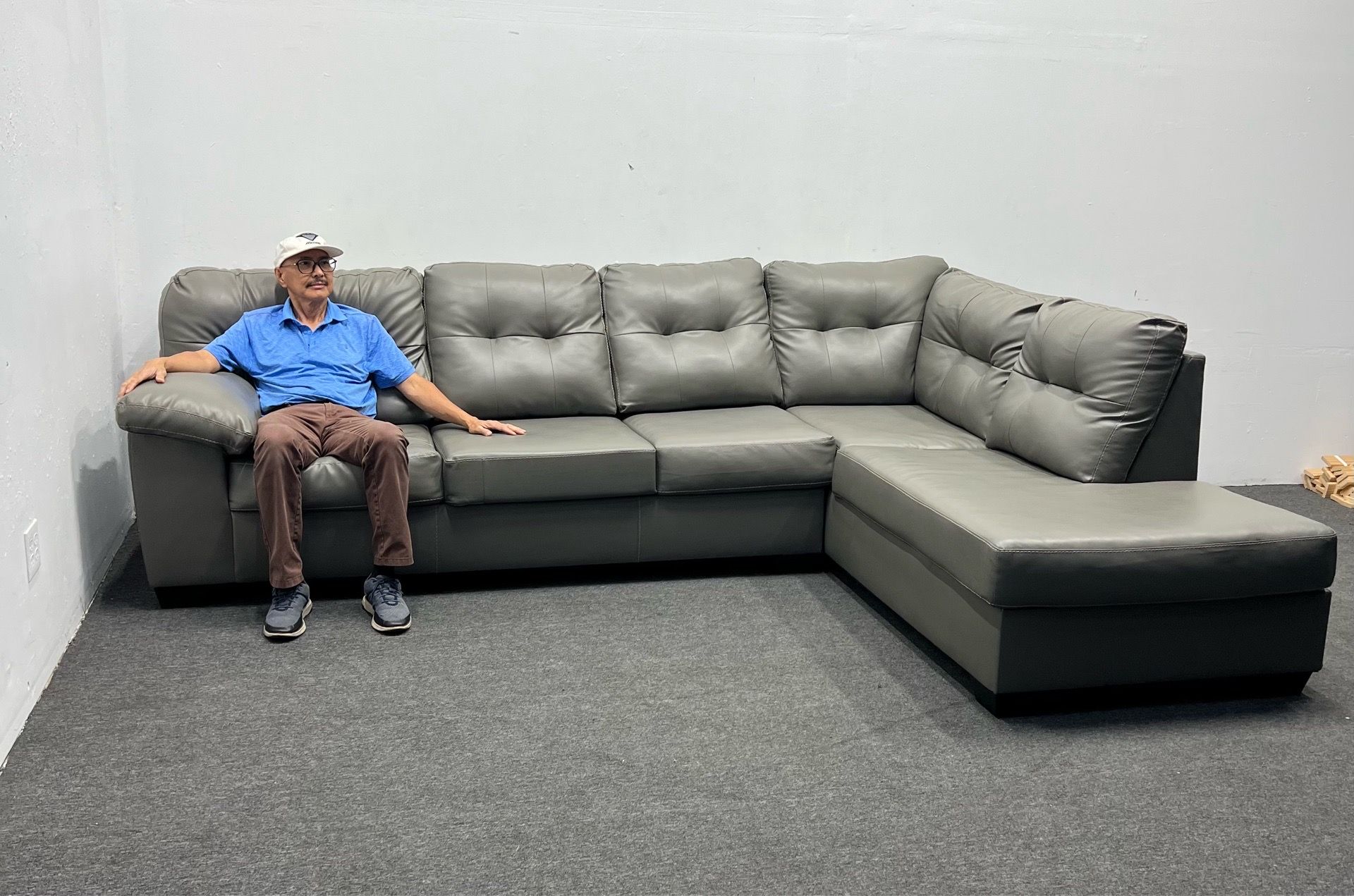 Ashley leather sofa left-arm facing sofa and right-arm facing corner chaise. We deliver & setup.