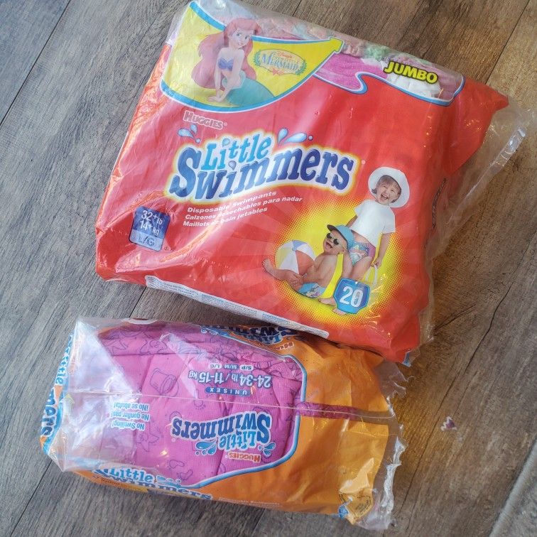 Pink And Disney Little Swimmer Diapers Huggies Large And Medium Size