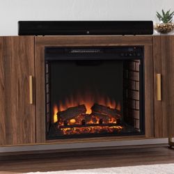 Still in box!! Ashley Furniture TV stand with electric fireplace! 