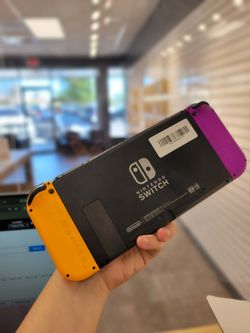 Nintendo Switch - V2 with Orange and Purple Joy-Con HAC-001(-01) Good