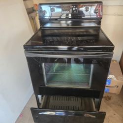 Oven And Microwave. Black Whirlpool, Brand New Condition.