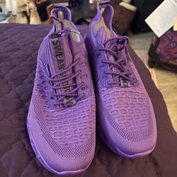 brand new purple athletic shoes