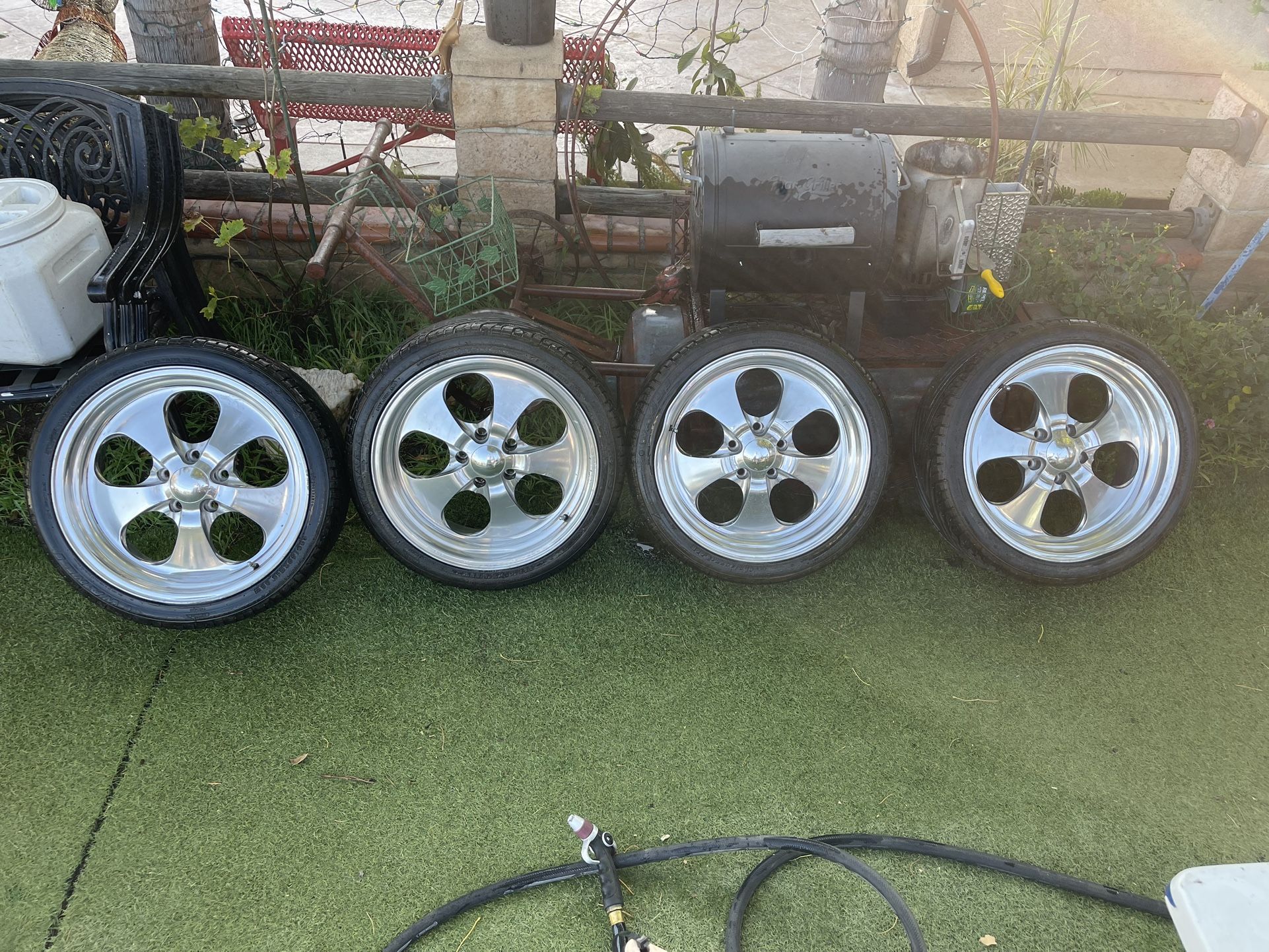 18 Inch Eagle Alloy Rims And Tires. Two Of Them Have A Pothole Bend