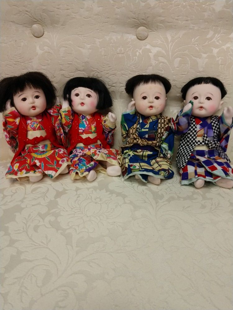 Vintage porcelain Oriental dolls