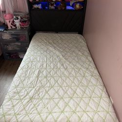 twin bed with mattress have  light and plug, and usb plug 