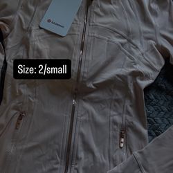 Pink define lululemon jacket with rose gold zipper