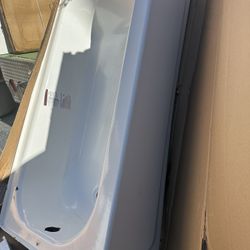 Bathtub 30 x60 steel left side hole on sale have small dents on top only /also we have walls  for $250 have some dents too new open box if you interes
