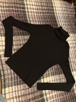 Black lined turtleneck, tight fitting