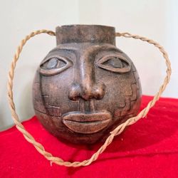 Vintage Chilean Studio Pottery Face Vessel – Signed Emilio Saavedra Chile – Pre-Columbian Style Terracotta Hanging Pot (Approx. 6.5")
Up for sale is