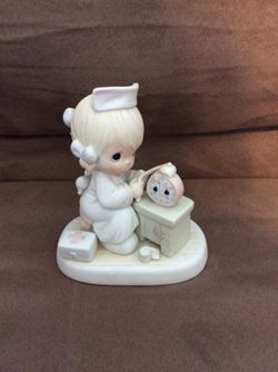 Precious Moments nurse
