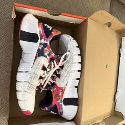 Nike Free Metcon 4 sneakers in white and multi